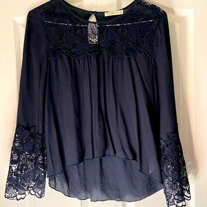 Abercrombie and Fitch navy blue crape top with flared sleeves of lace